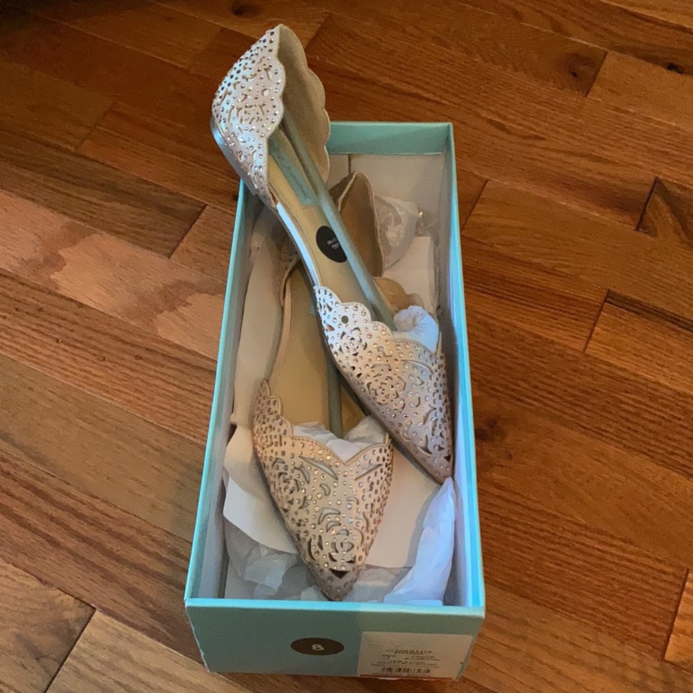 Betsy Johnson champagne embellished laxer cut flat